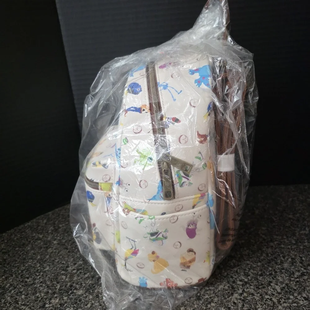 Loungefly Disney Pixar 25th Anniversary Icons Toy Story Nemo Backpack 2021 NWT